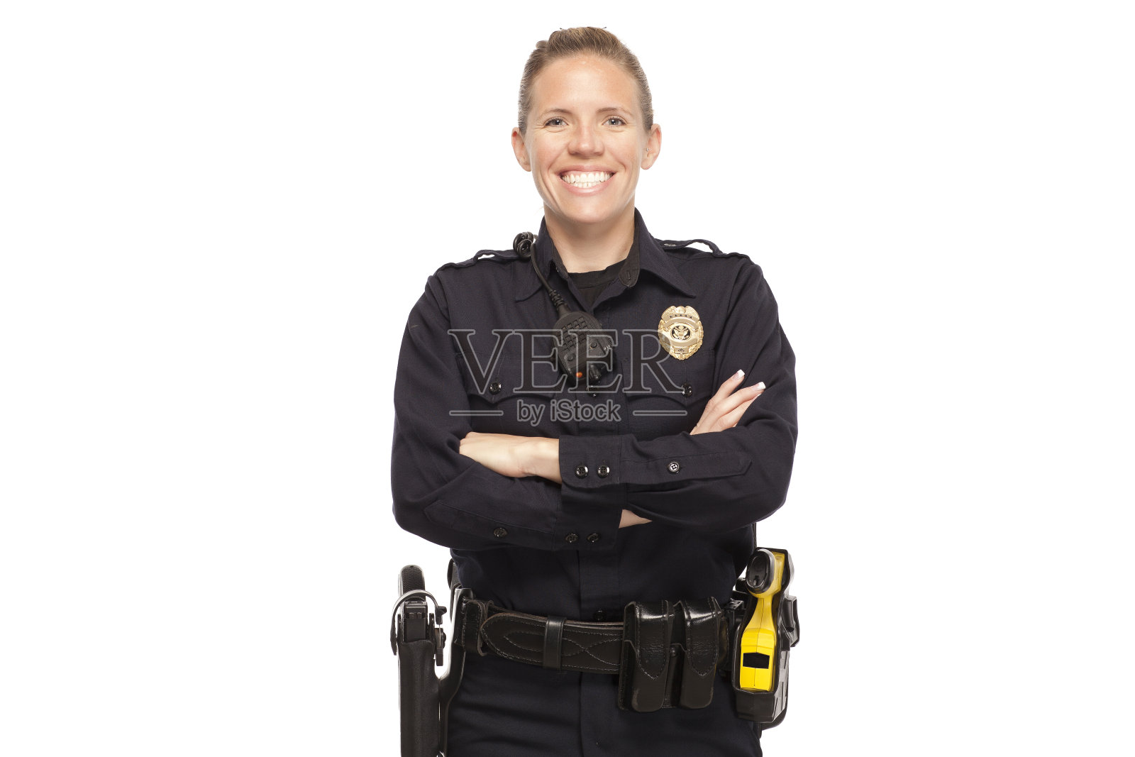 双臂交叉的女警官照片摄影图片