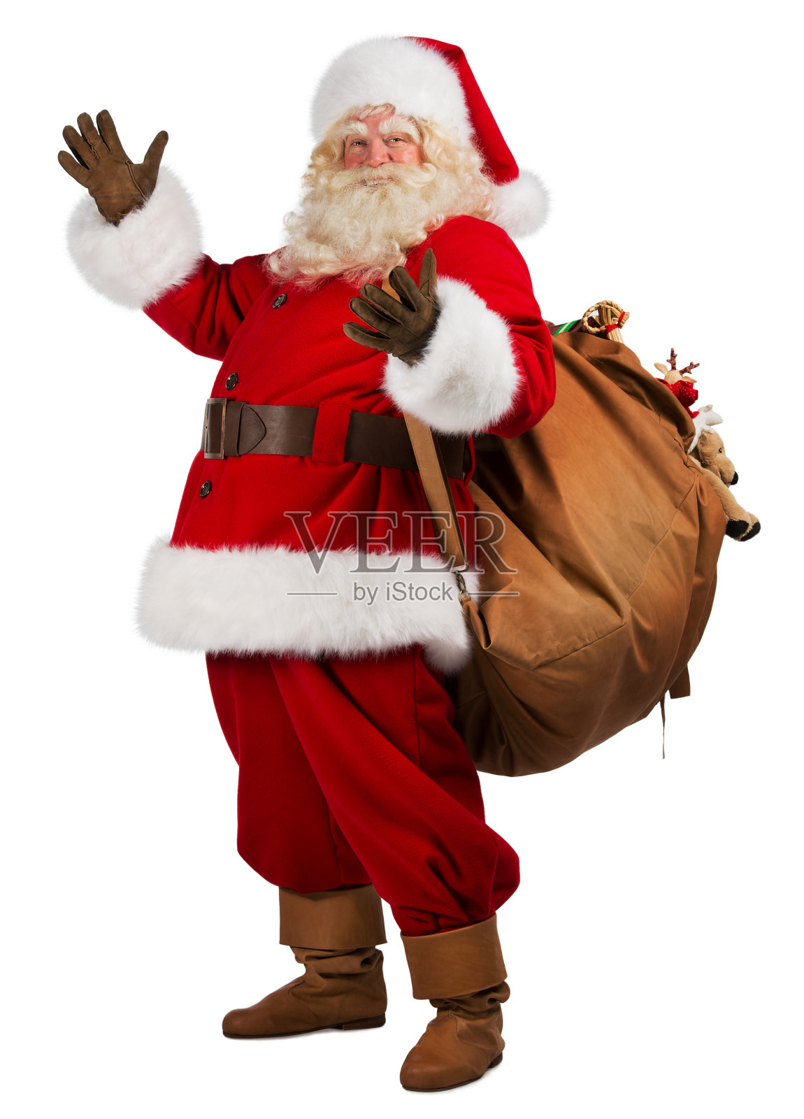 真正的圣诞老人背着装满礼物的大袋子照片摄影图片