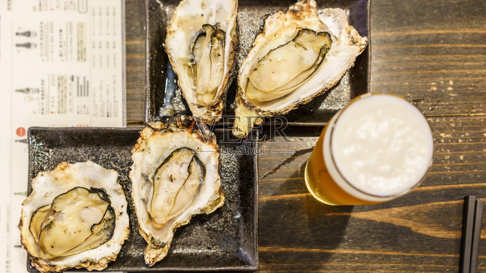 著名招牌菜:日本广岛宫岛烤牡蛎照片摄影图片