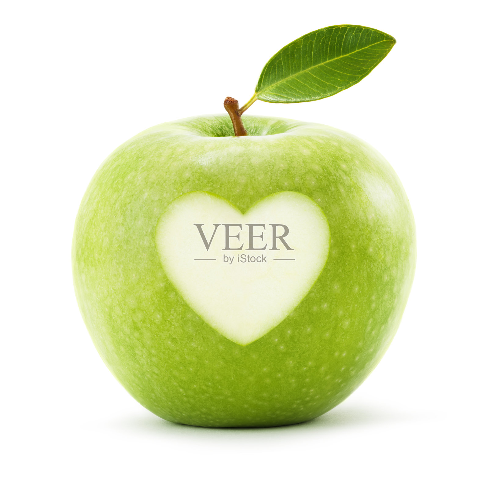 绿色的苹果，叶子和心的象征孤立在白色的背景照片摄影图片