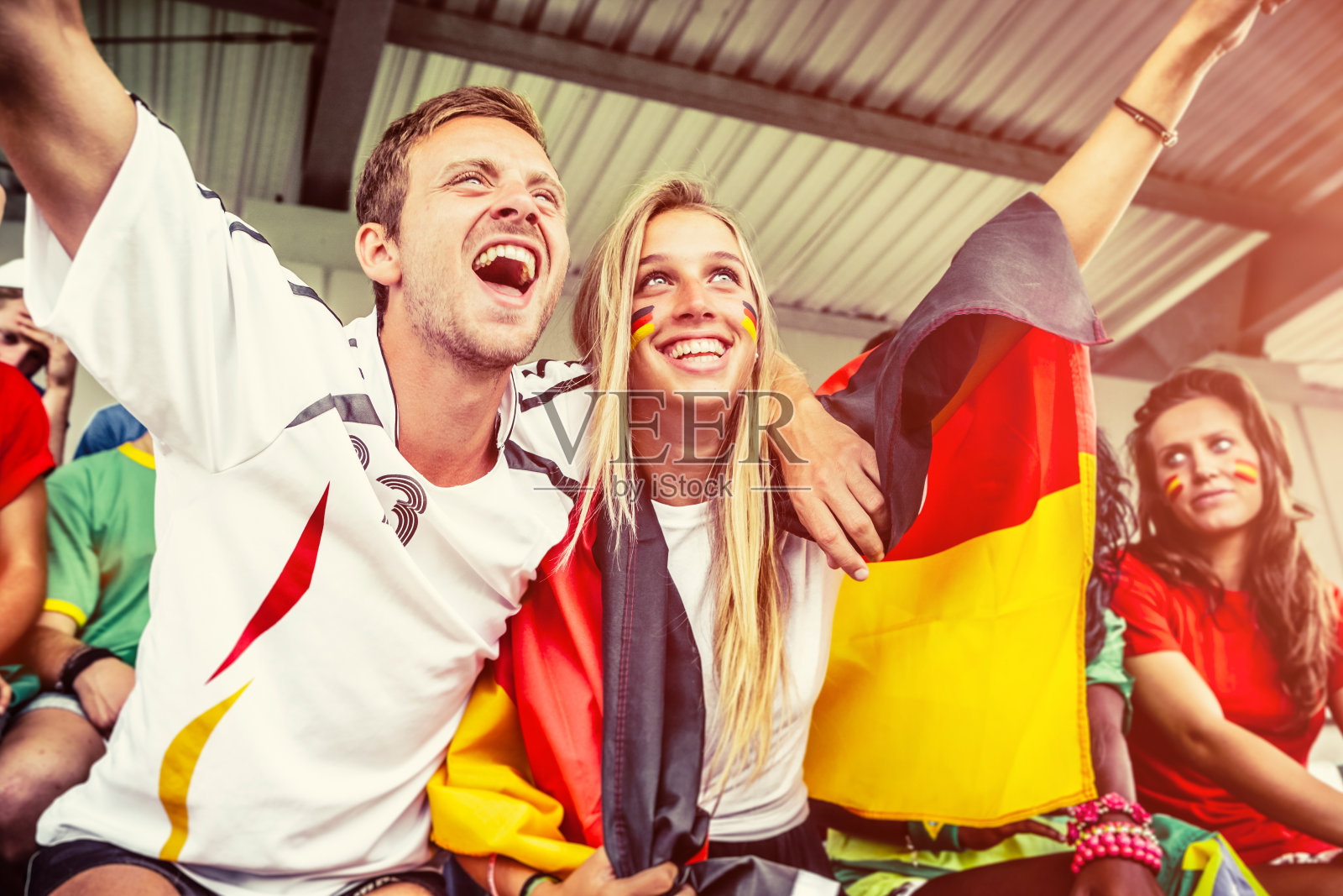 德国夫妇支持球队，足球锦标赛照片摄影图片