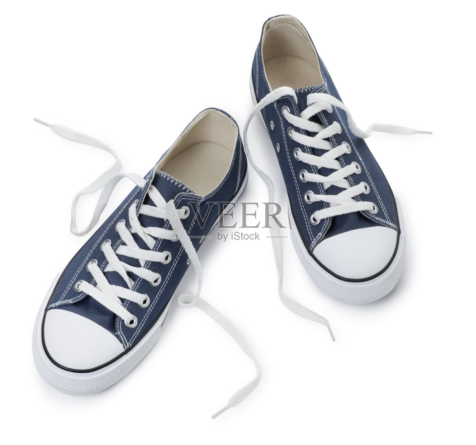 蓝色运动鞋在白色的背景照片摄影图片
