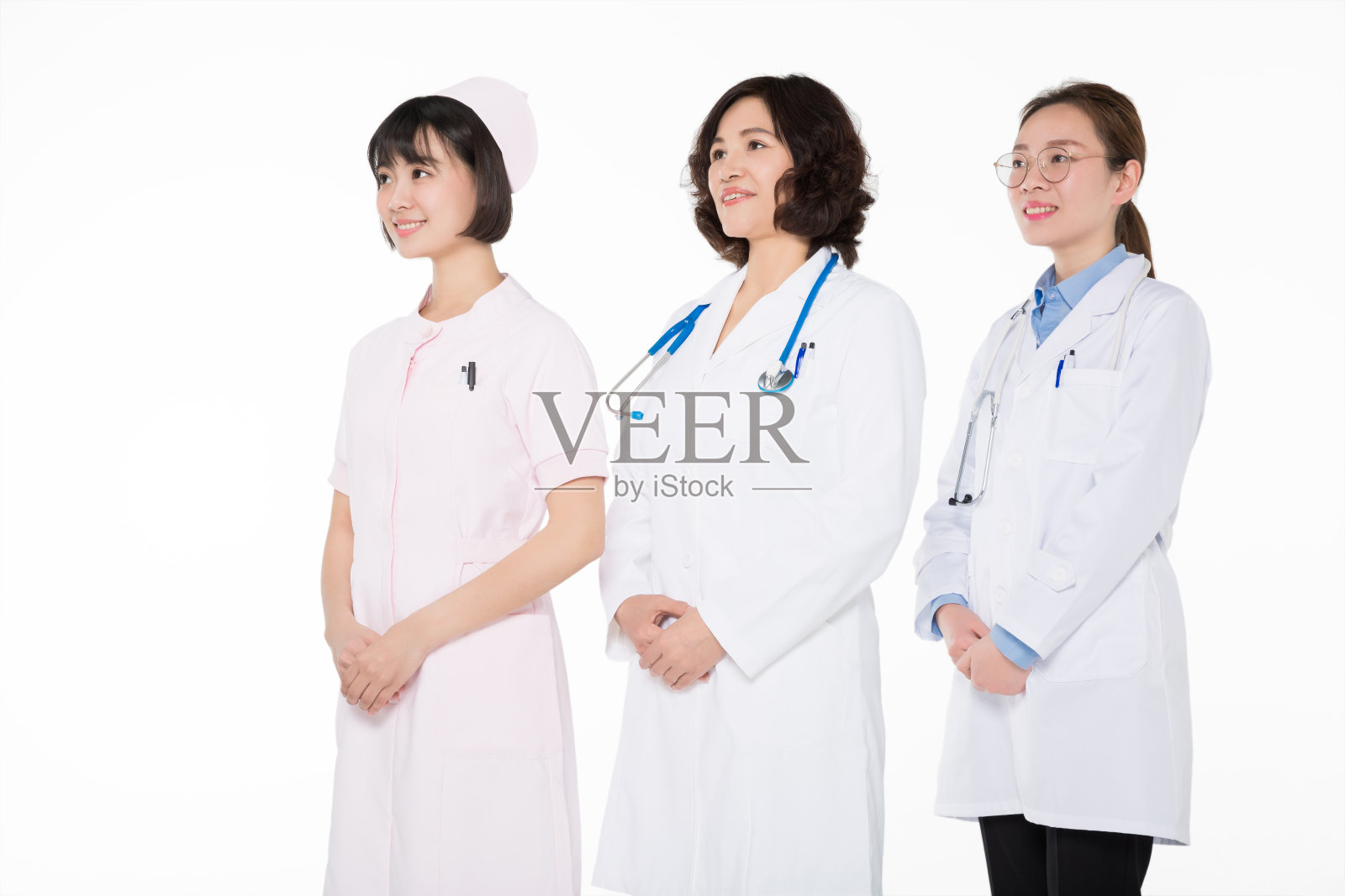 一个自信的医疗团队在白色背景下的肖像照片摄影图片