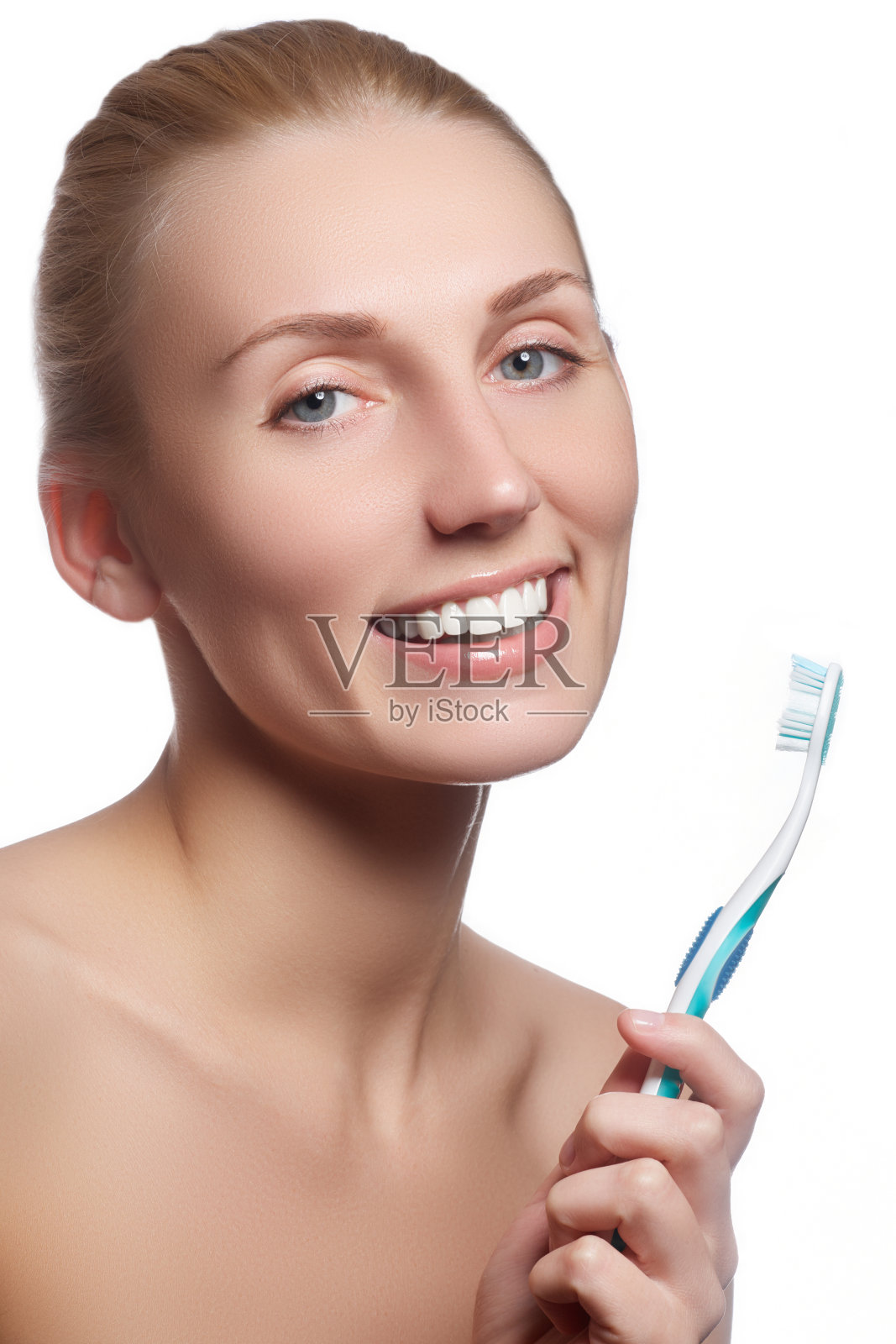 带着牙刷的漂亮女人。牙科保健背景照片摄影图片