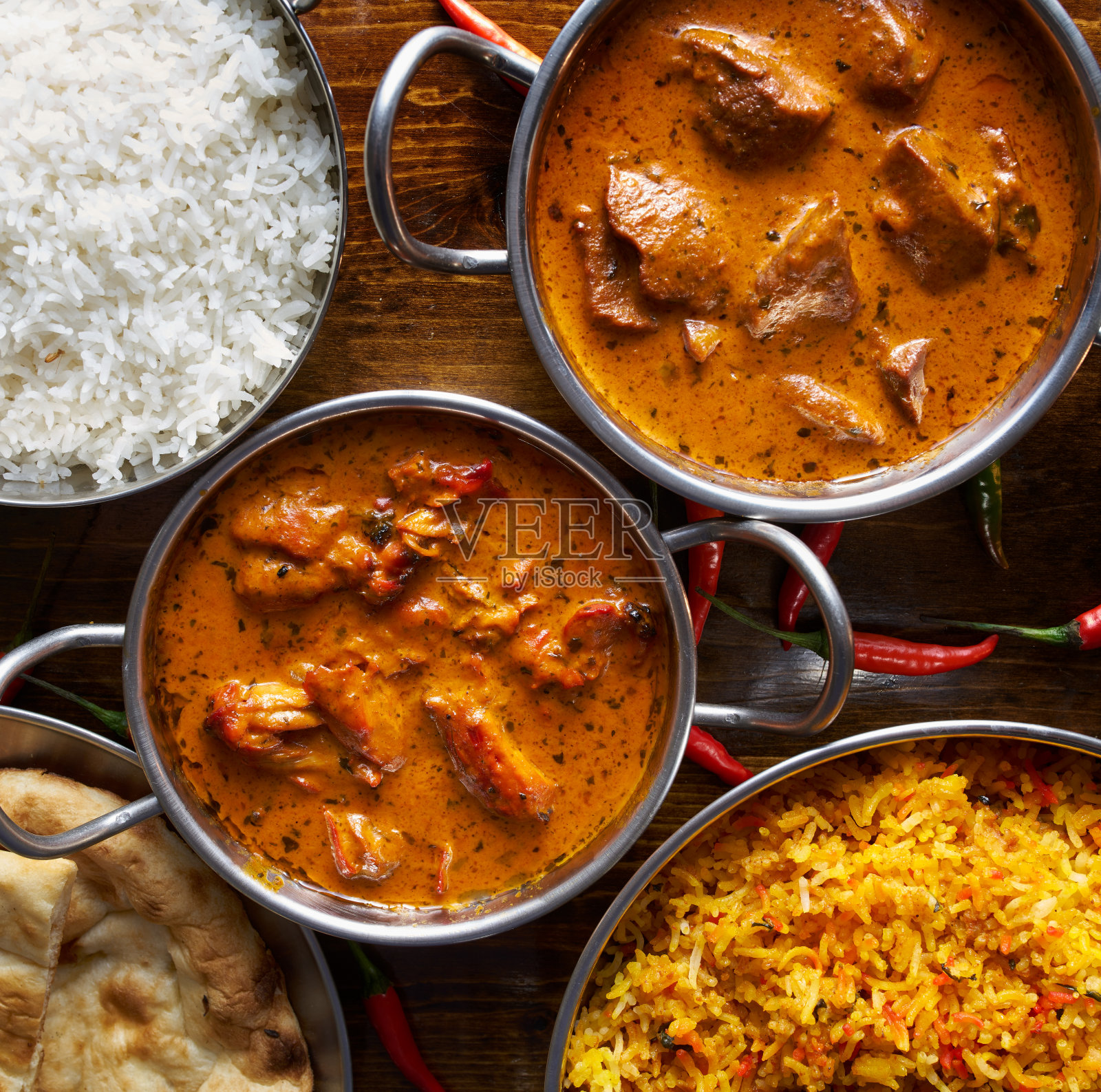 各式印度咖喱和米饭菜肴照片摄影图片
