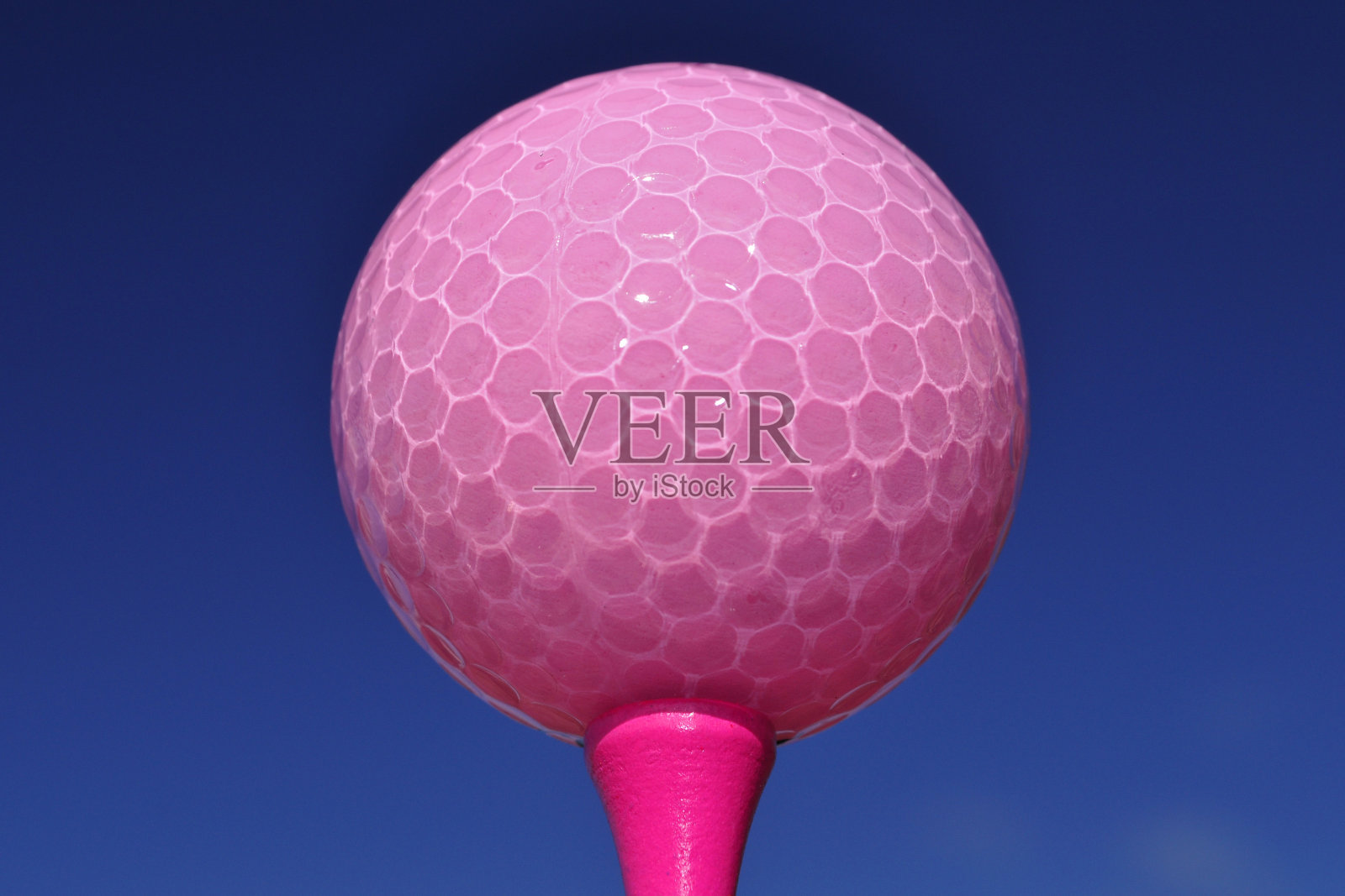 粉红色的高尔夫球照片摄影图片