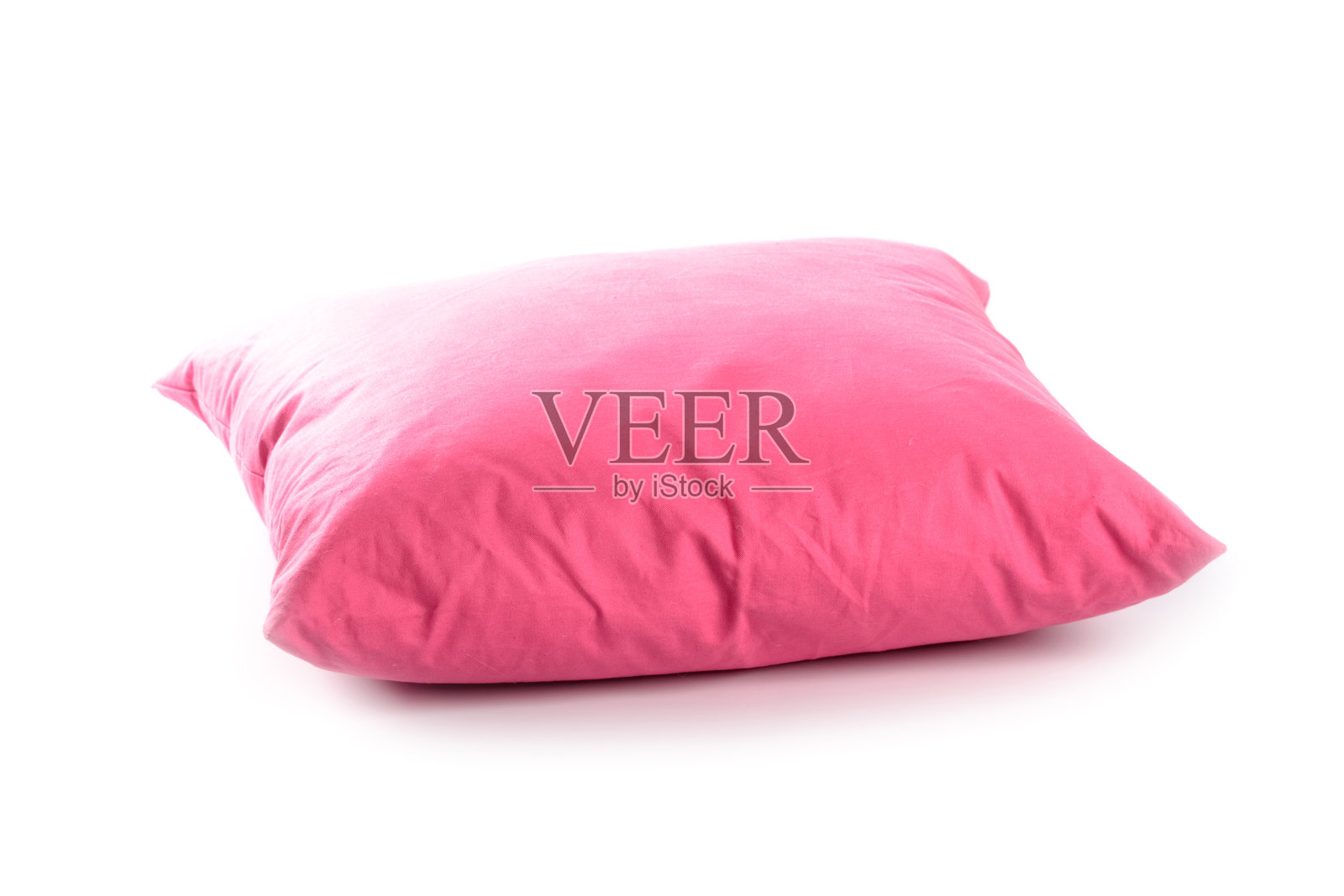 白色背景上的粉色枕头照片摄影图片