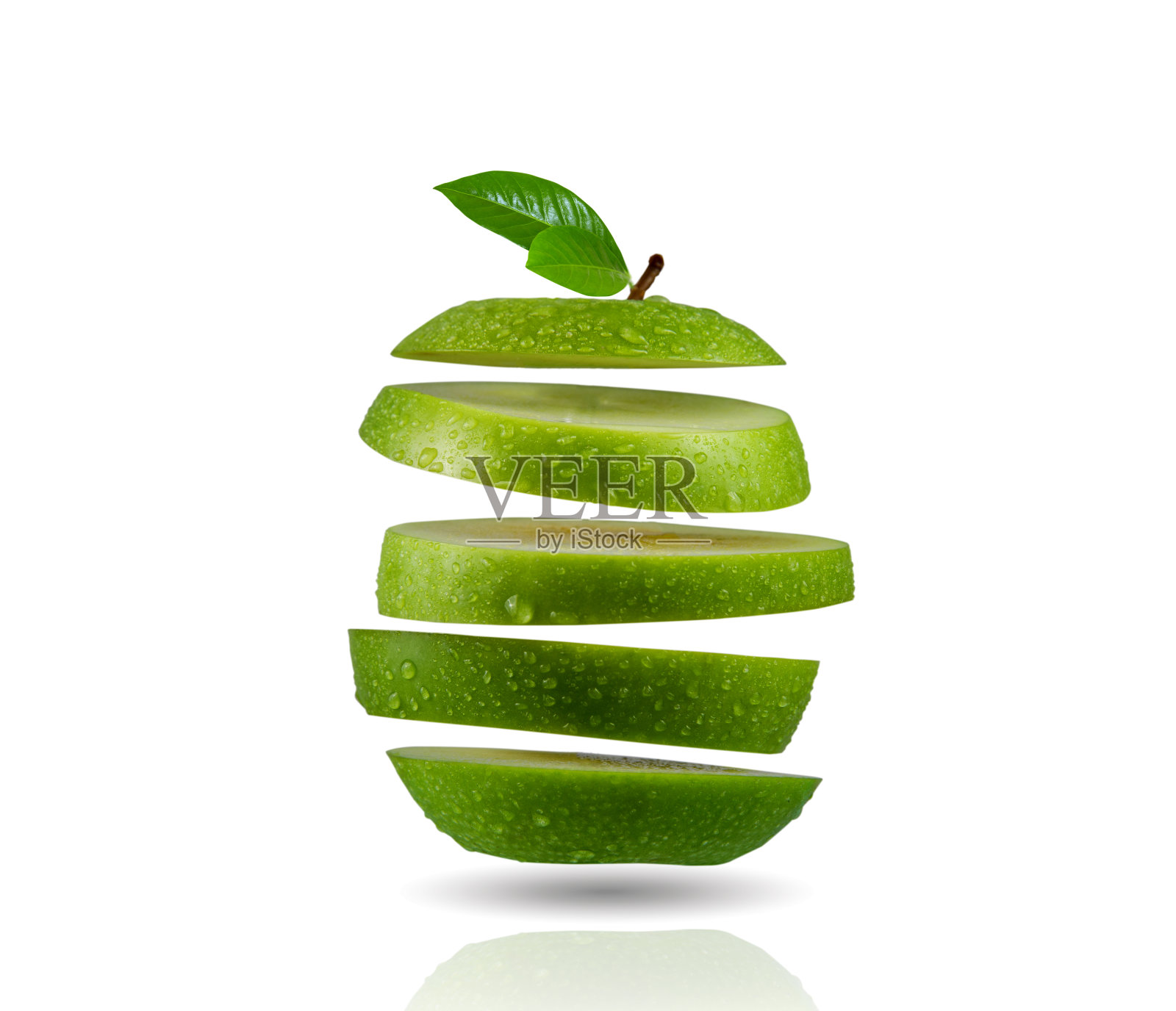 切片的绿苹果在白色的背景照片摄影图片