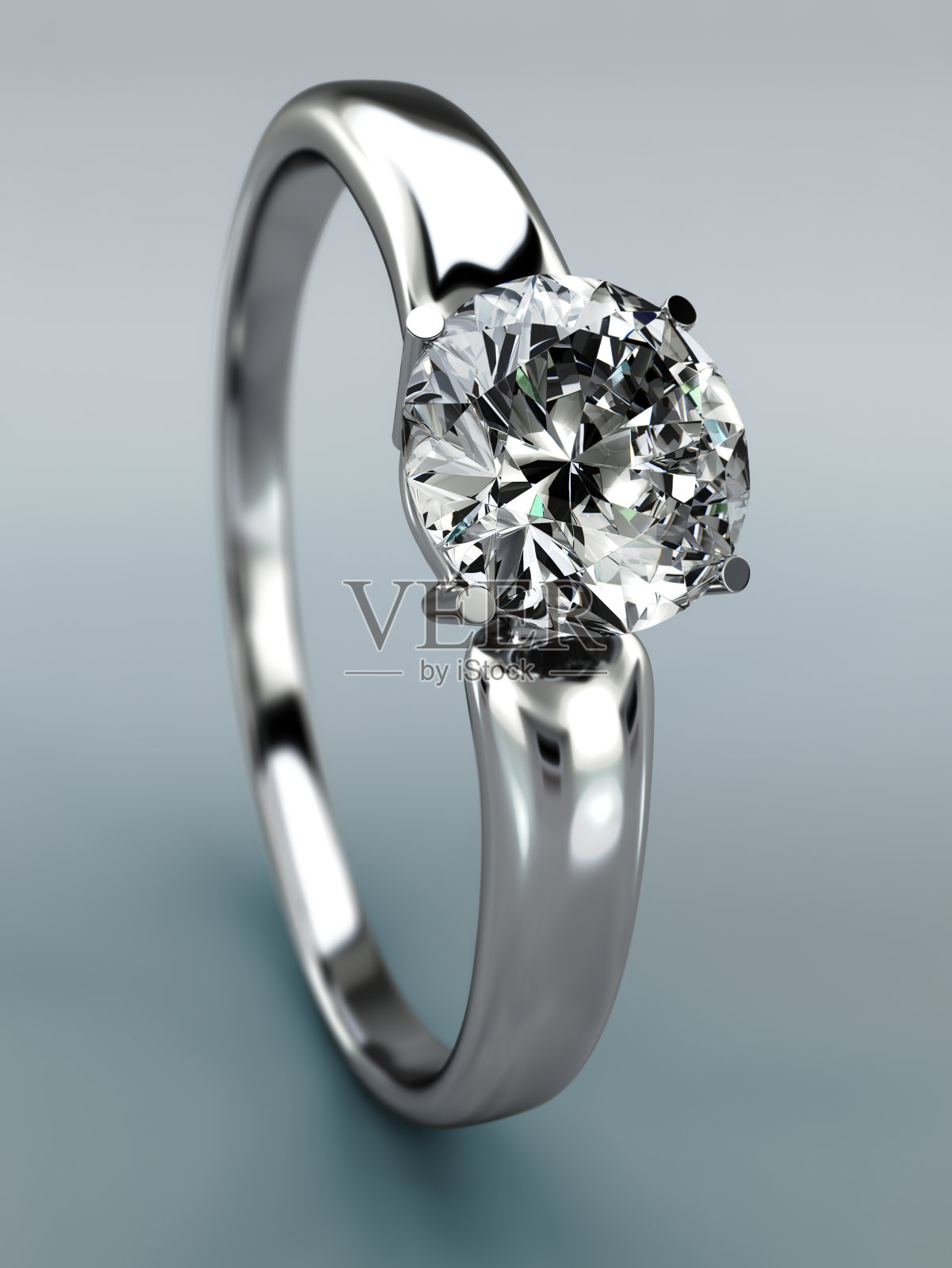 订婚戒指。美丽的闪闪发光的钻石。美丽的圆形翡翠图画。照片摄影图片