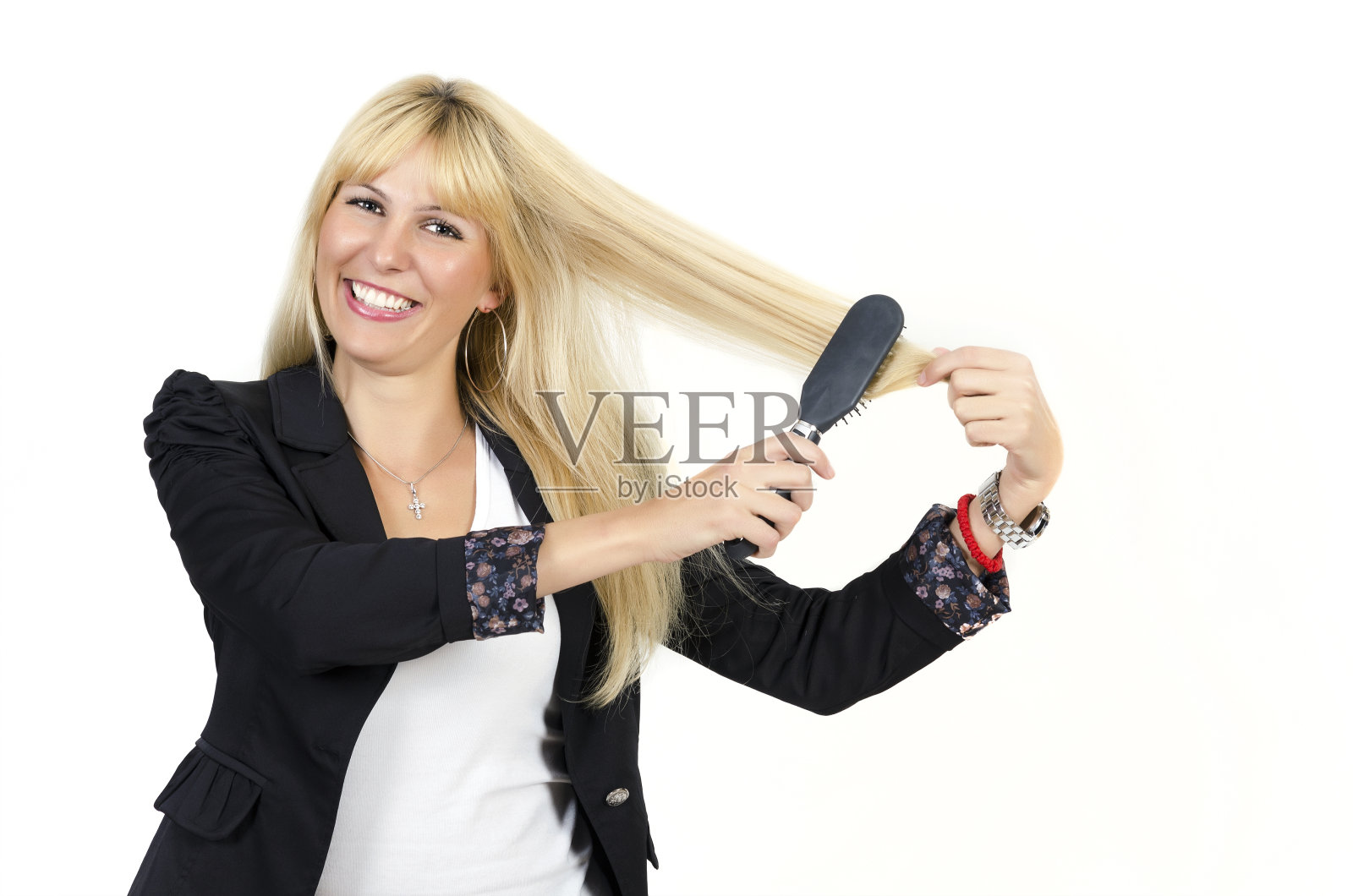 女人梳理头发照片摄影图片