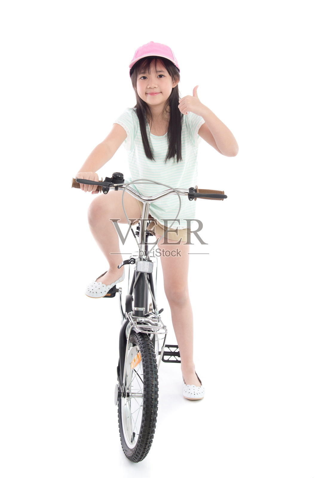一个骑自行车的亚洲女孩照片摄影图片