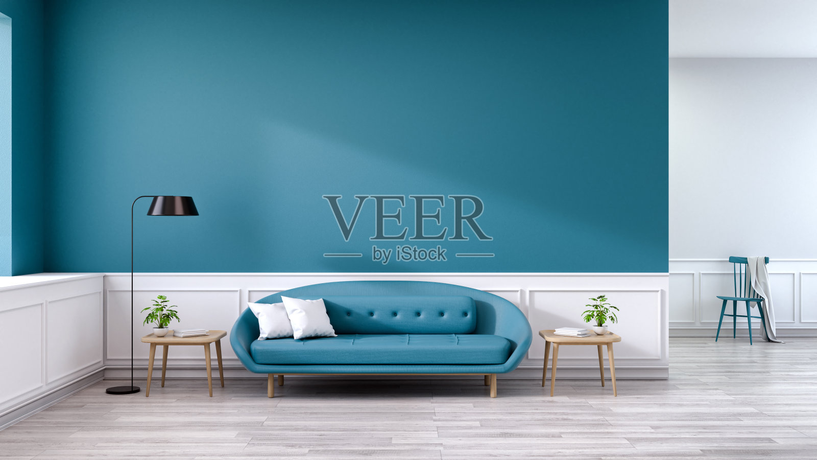 极简的客厅内饰，蓝色沙发配木桌，木地板上黑色台灯，深蓝色墙面，3d渲染照片摄影图片