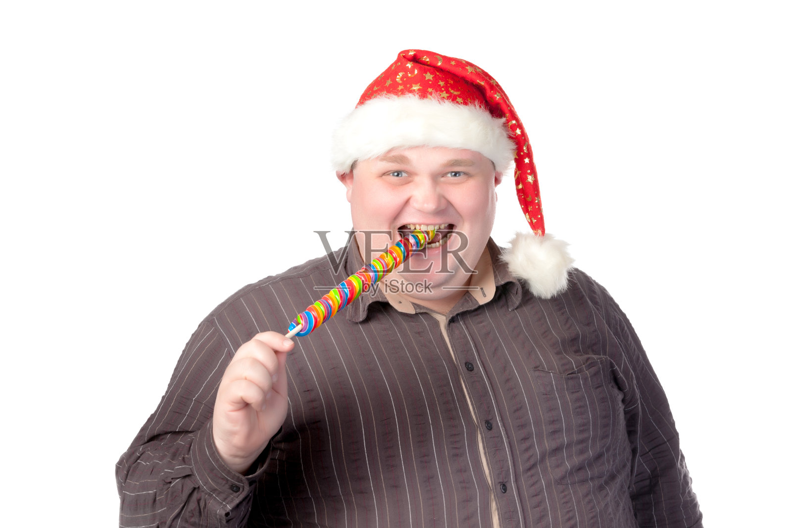 戴着圣诞帽的快乐的胖男人照片摄影图片