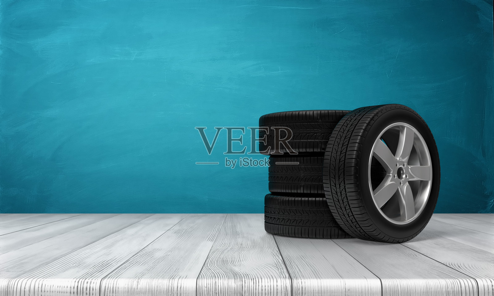 一个汽车轮胎的3d渲染倾斜在三个轮胎站在一个木制表面在前面的蓝色背景。照片摄影图片