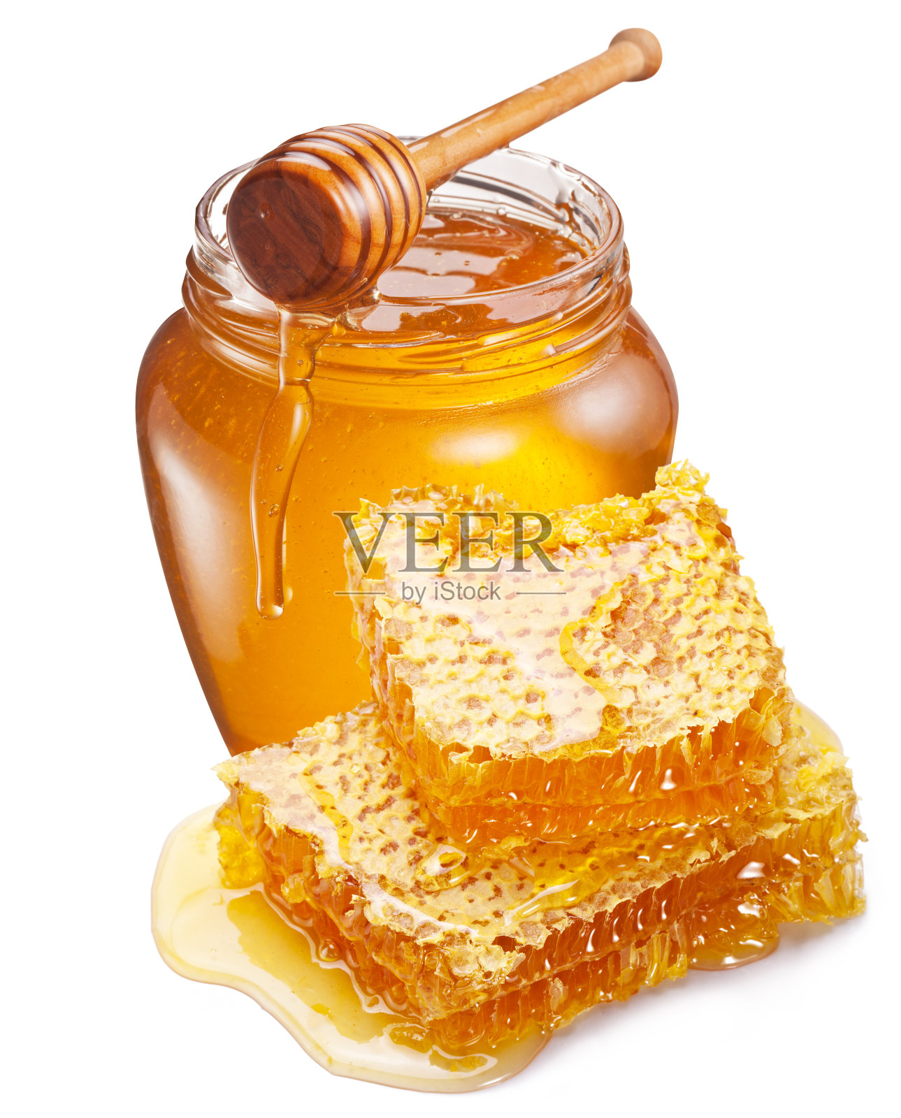 装满新鲜蜂蜜和蜂巢的罐子孤立在白色的背景上。照片摄影图片