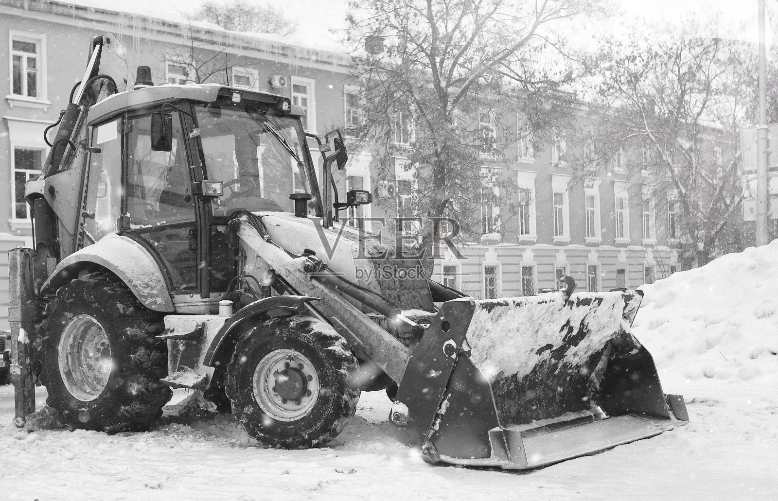 铲雪机用一桶户外街道城建照片摄影图片