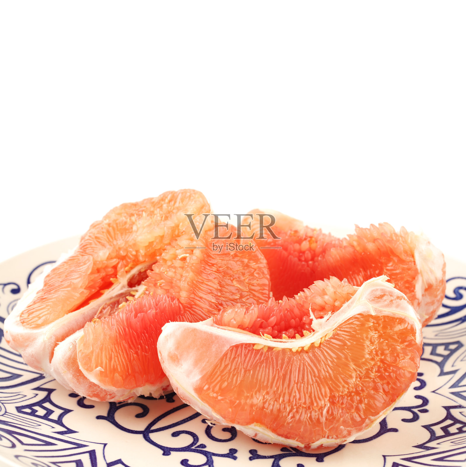 去皮的葡萄柚果实，孤立在白色背景上照片摄影图片