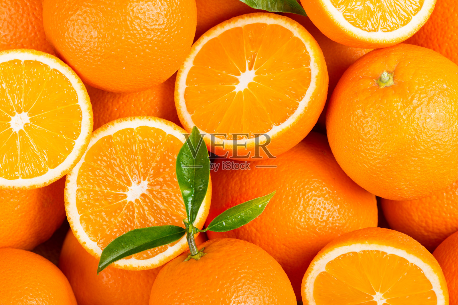 选择橙色水果。照片摄影图片