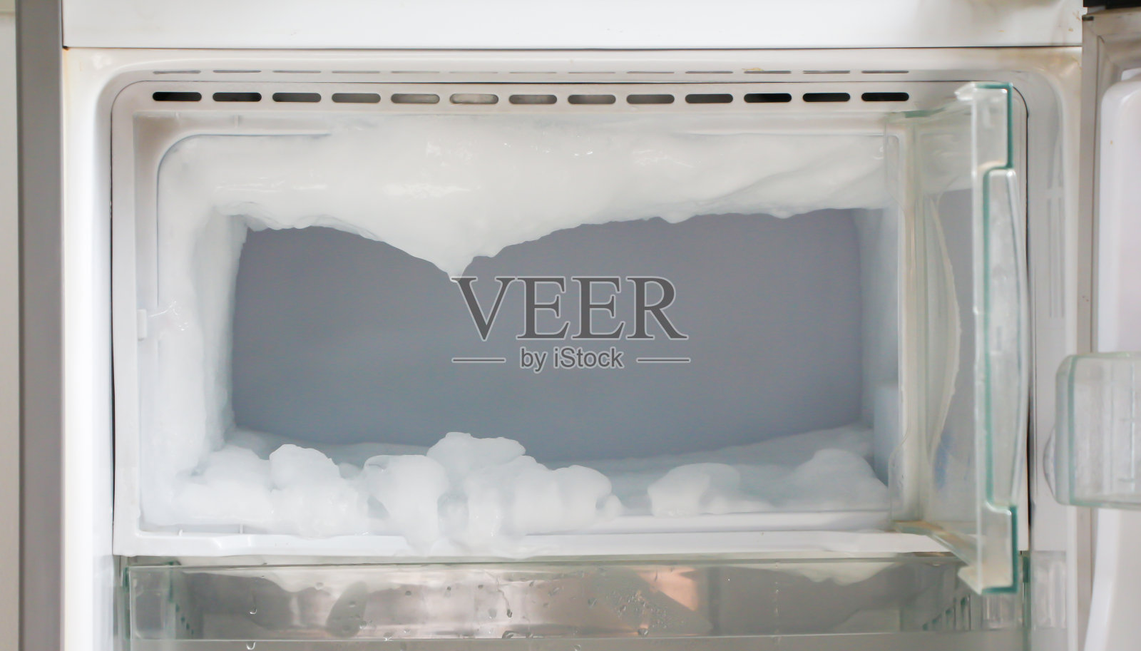冰在冰箱里冻结了照片摄影图片