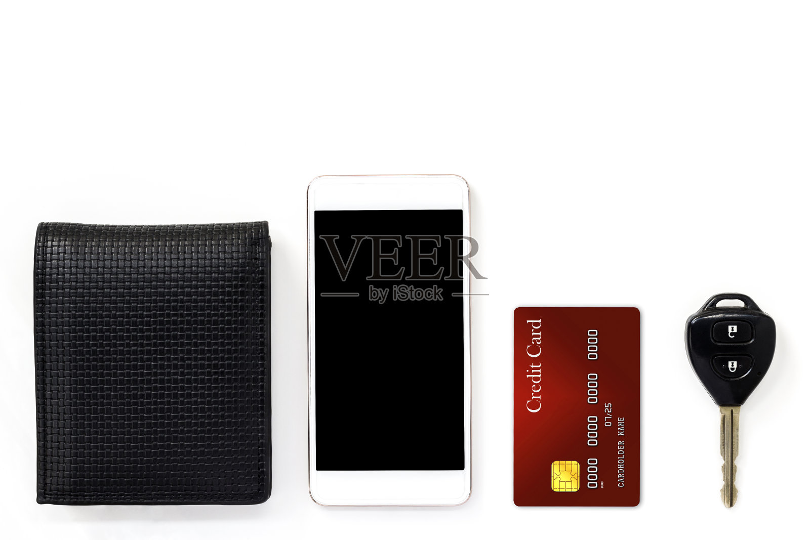 手机和信用卡，钥匙和钱包孤立在白色背景。照片摄影图片