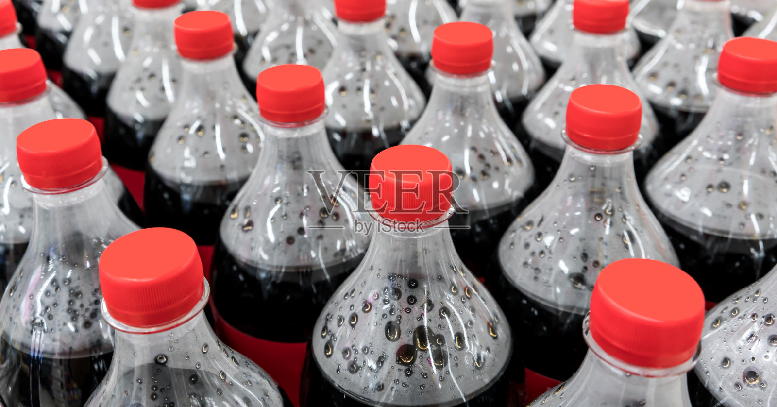 塑料瓶与碳酸软饮料的背景照片摄影图片