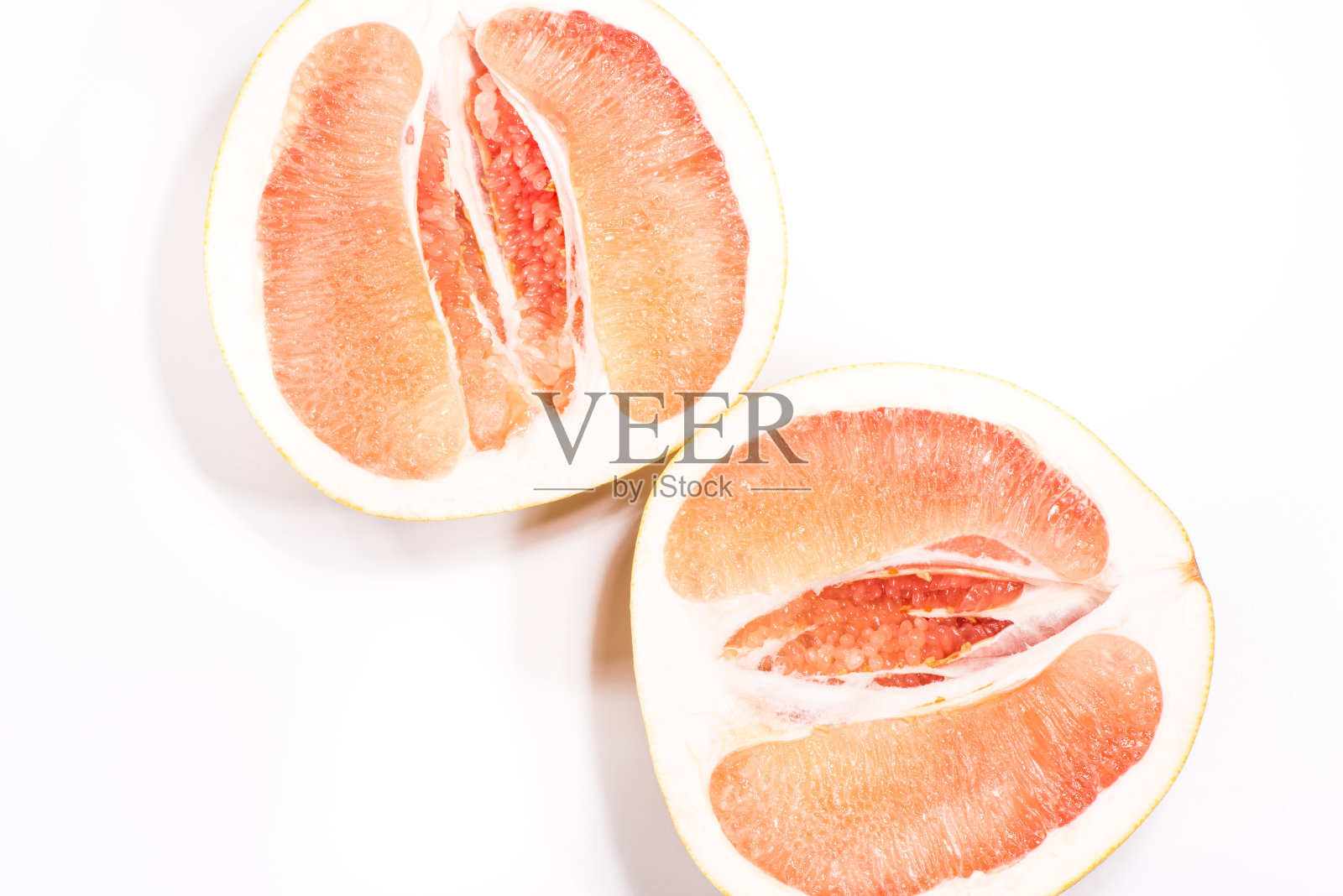 两半水果，柚子。照片摄影图片