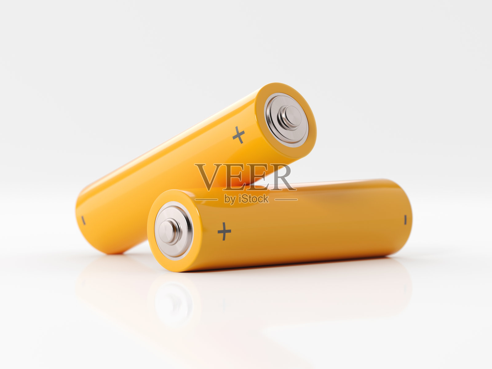 白色背景下的两节黄色电池照片摄影图片