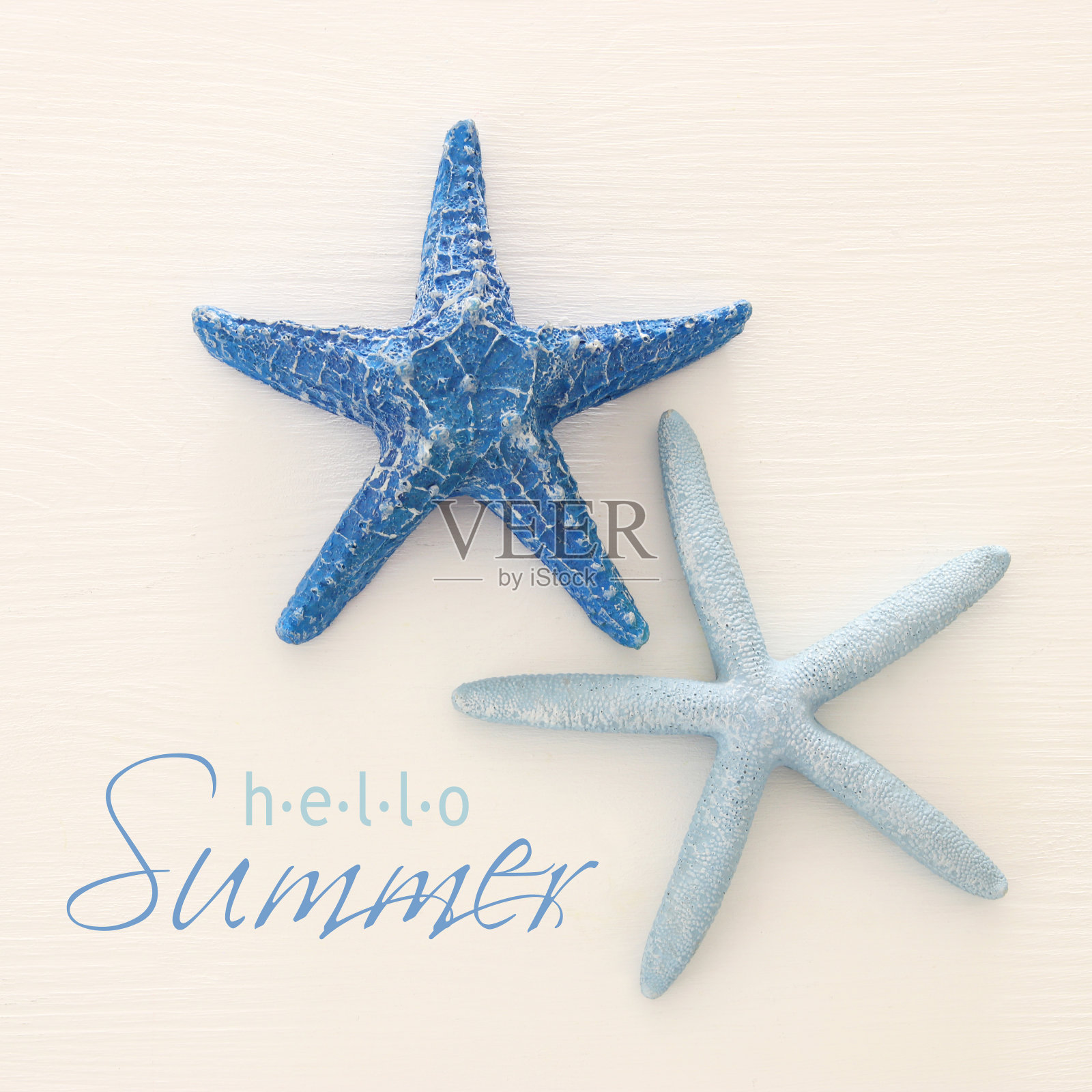 假期和夏天的形象与海星在木制的背景。照片摄影图片
