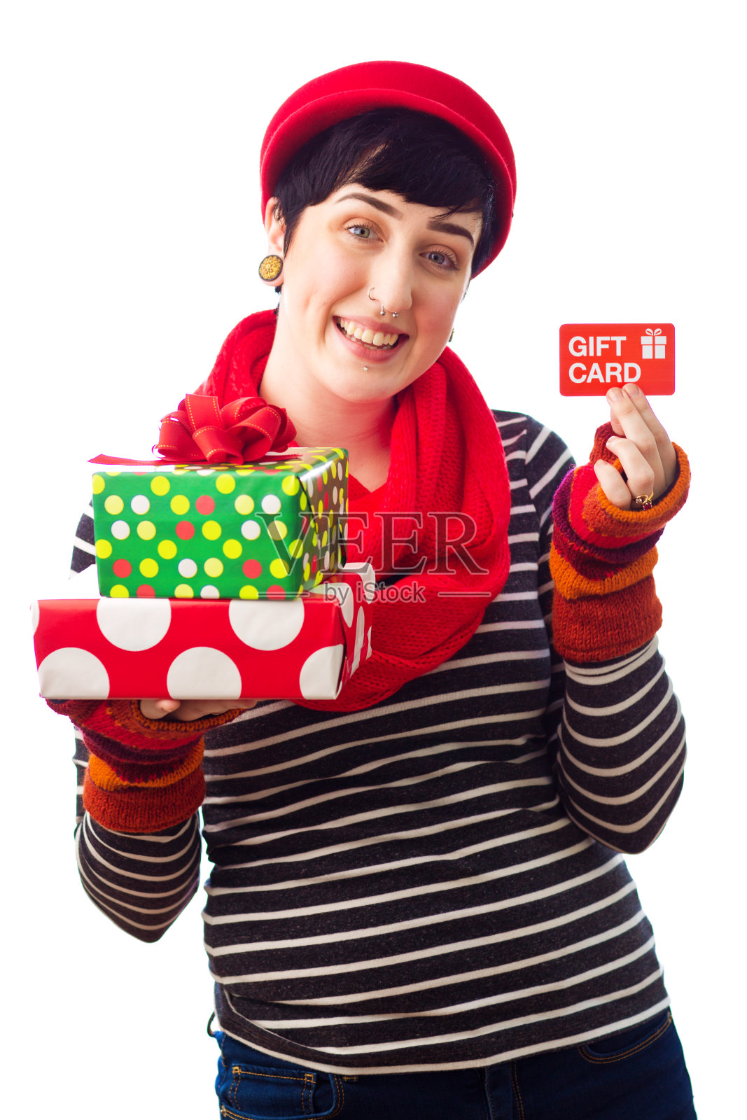 千禧年的年轻女子与圣诞礼物和礼品卡的白色背景照片摄影图片