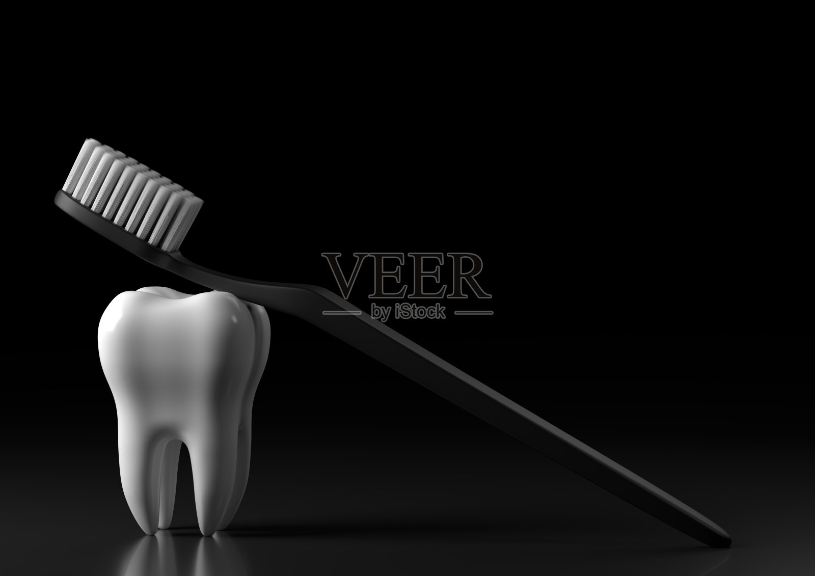 牙刷和白色的牙齿在黑色的背景照片摄影图片