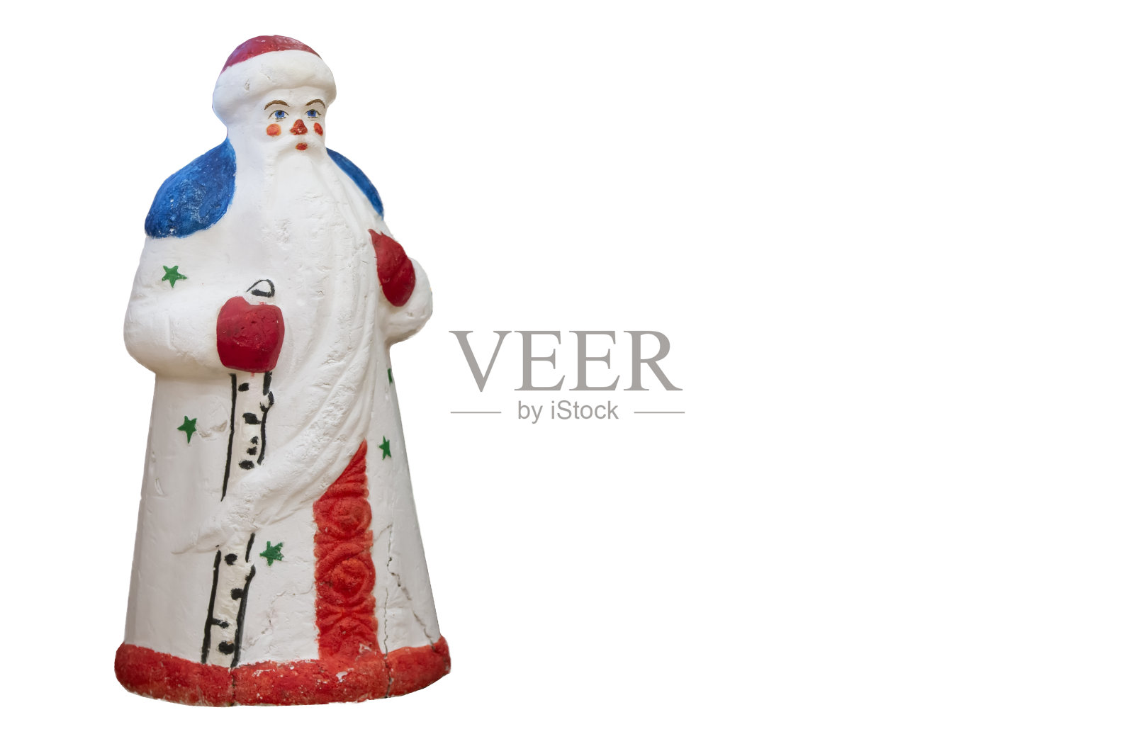 玩具复古的俄罗斯圣诞老人在白色的背景。照片摄影图片