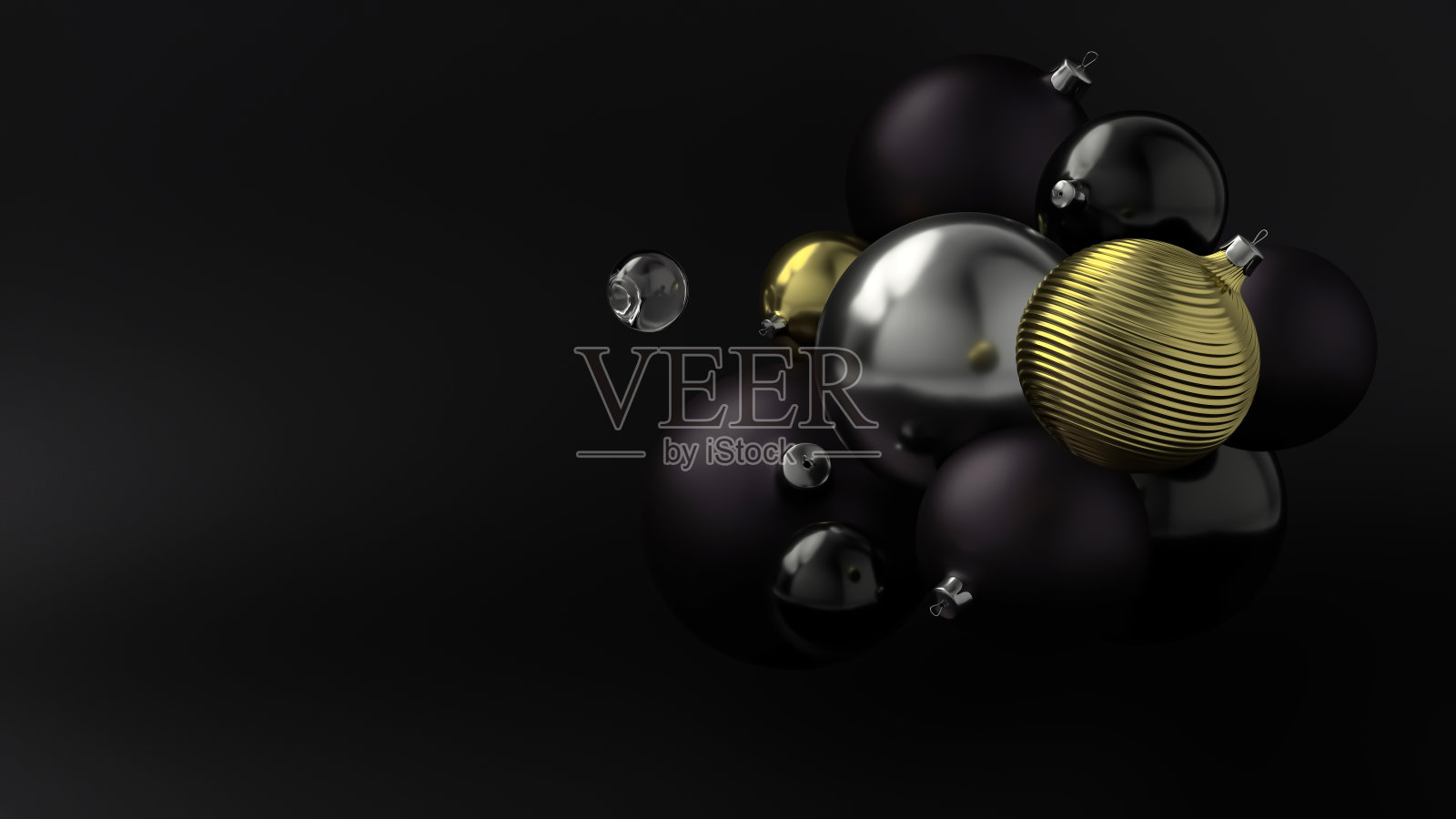 新年的金球背景是黑色的球。照片摄影图片