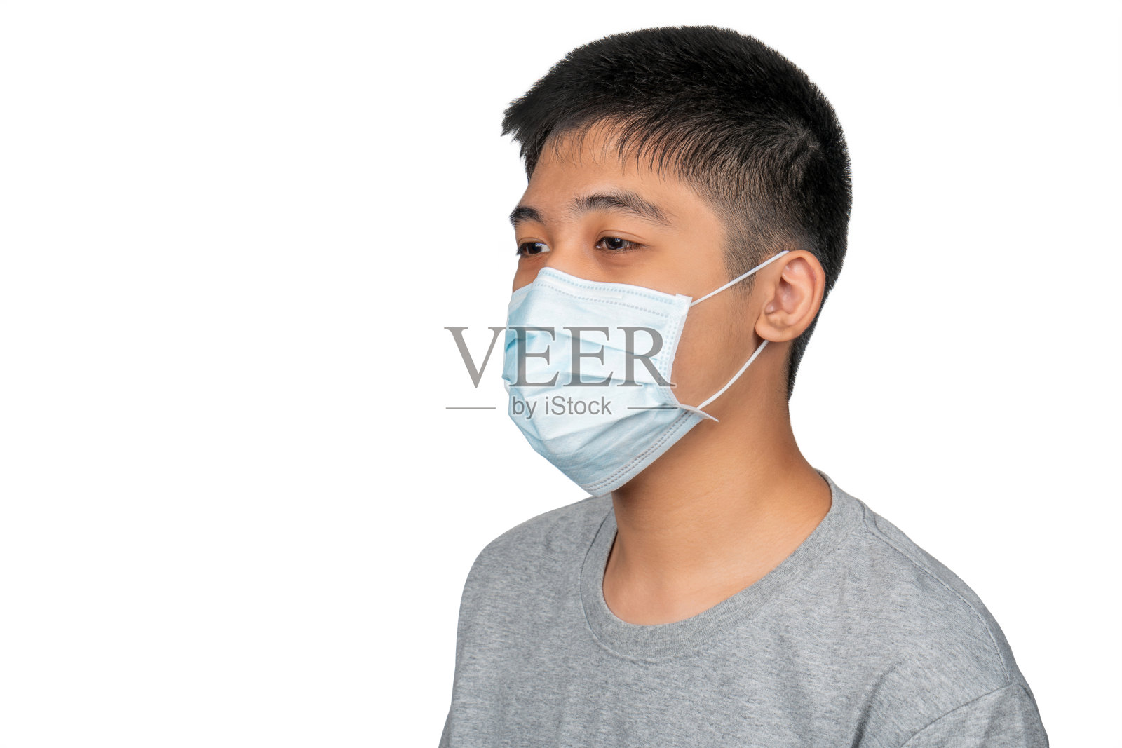 亚洲小男孩戴防毒面具，防止他人感染流感、感冒、冠状病毒、COVID-19和SARS cov 2。照片摄影图片