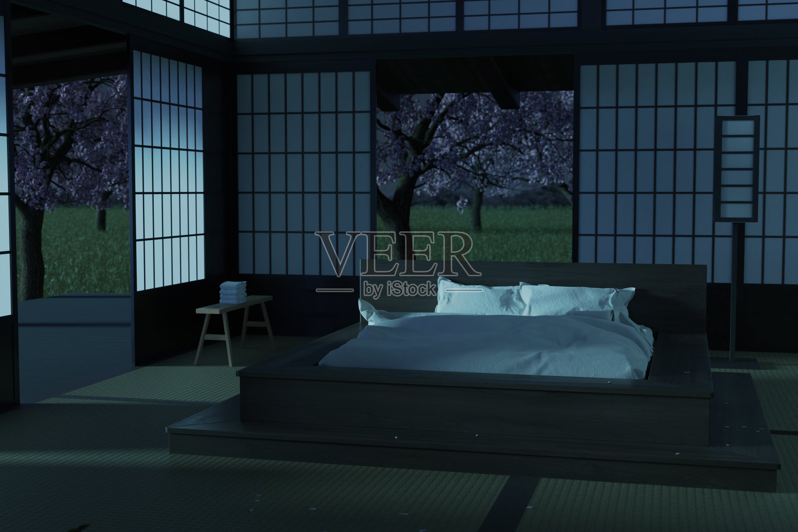 舒适的传统日本卧室的3d渲染在晚上盛开的花园前照片摄影图片