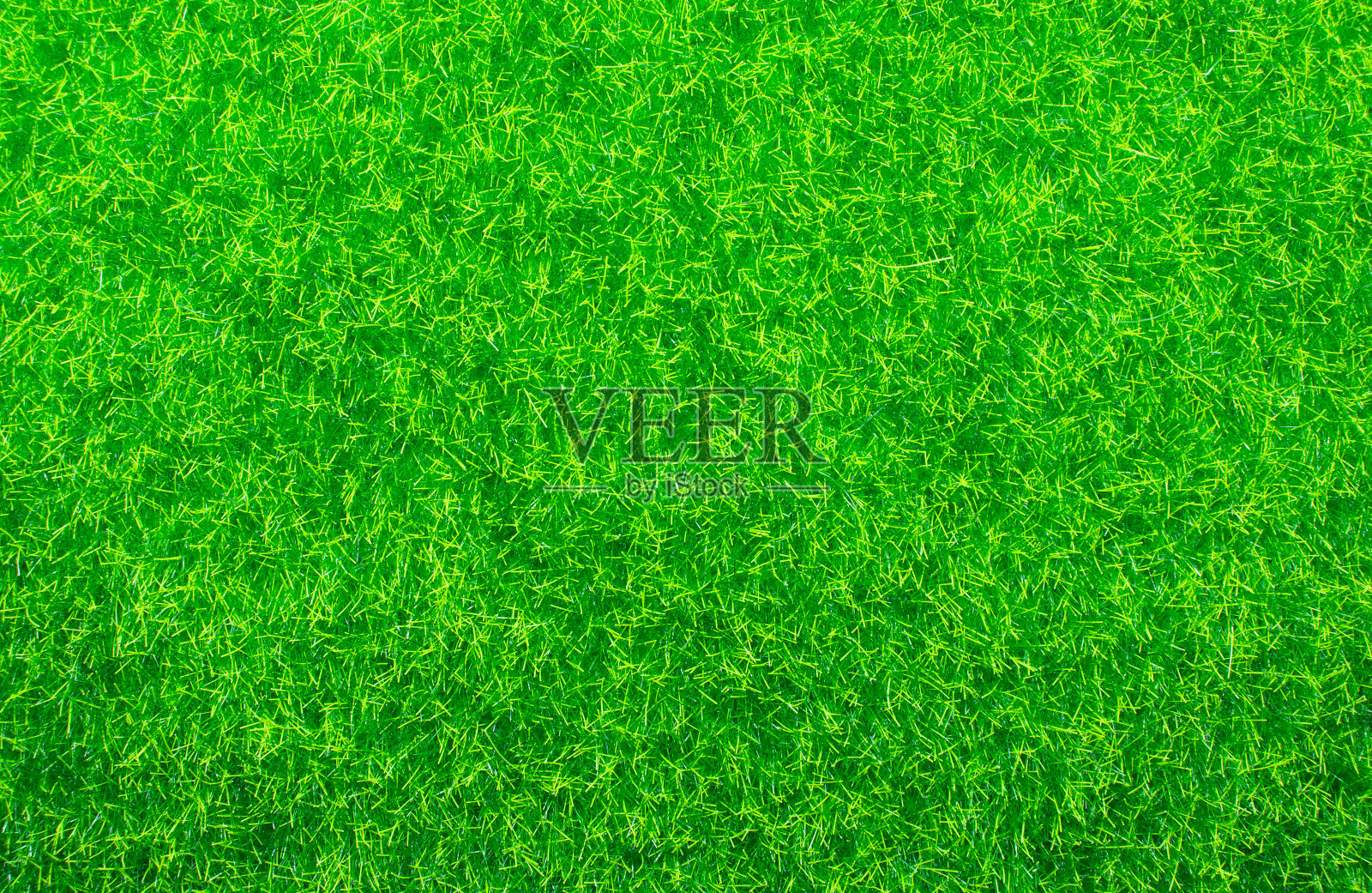 绿色的人造草皮。照片摄影图片