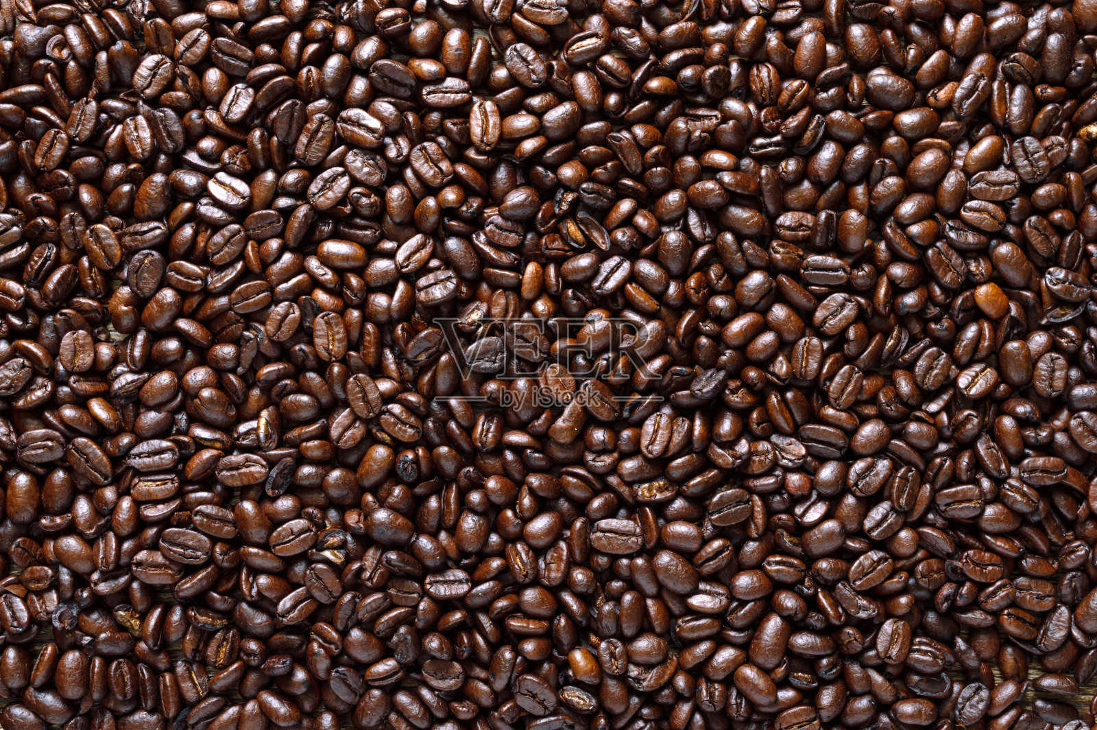 烤过的咖啡豆。咖啡的背景。俯视图，平放照片摄影图片