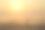 一个女人在迪拜附近的沙漠日出素材图片