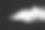 在黑色背景上发射白色粒子飞溅。在黑暗的背景下出现了奇异的白色粉末爆炸云。素材图片