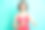 漂亮的女士拿着热饮穿红点连衣裙孤立的蓝绿色背景素材图片